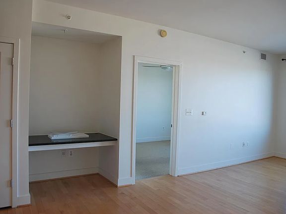 bright living room with built-in desk