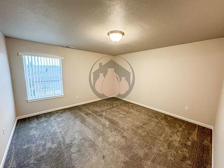 1668 SE Barberry Ave — Photo 15