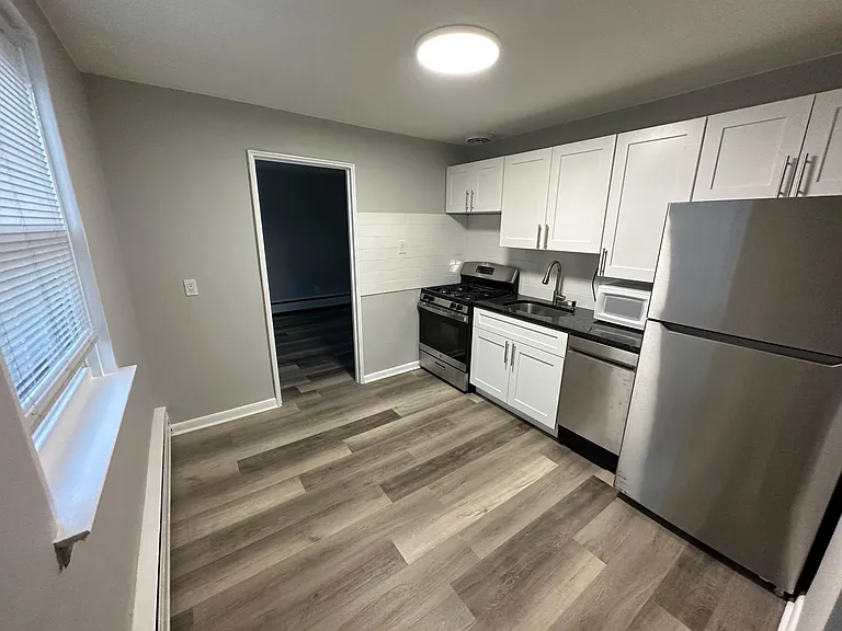 Newly Renovated Kitchen with dishwasher and microwave