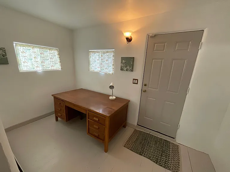 Front entry (used to be a porch) could be a small sitting room or office
.