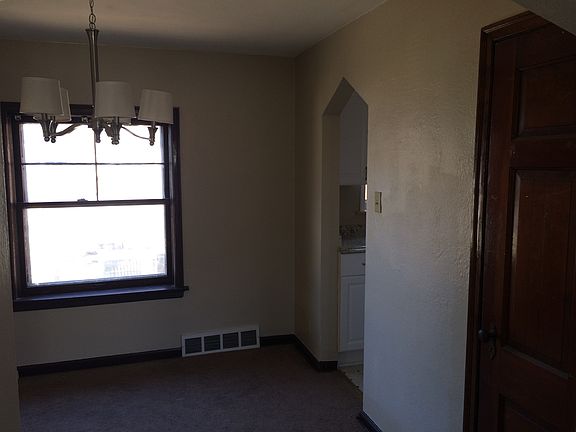 Separate dining room with new chandelier