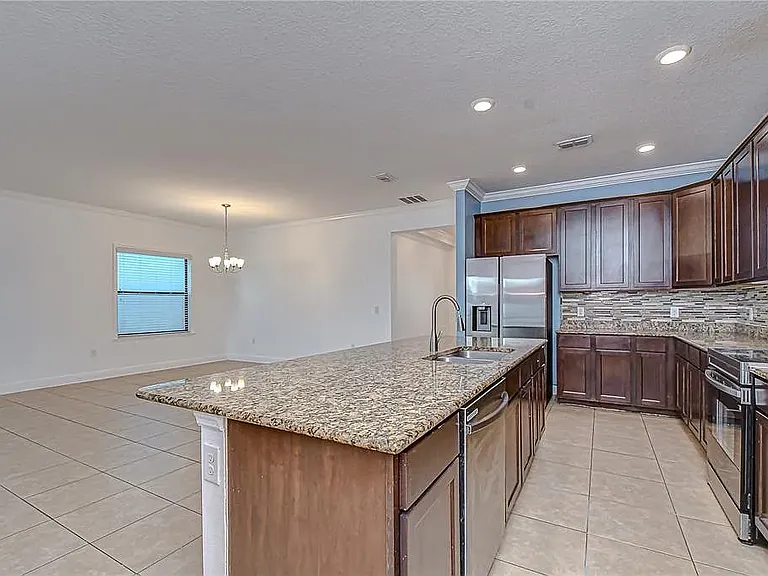 Note: Kitchen accent wall has since been professionally repainted to match the updated interior color scheme. Updated photos coming soon.