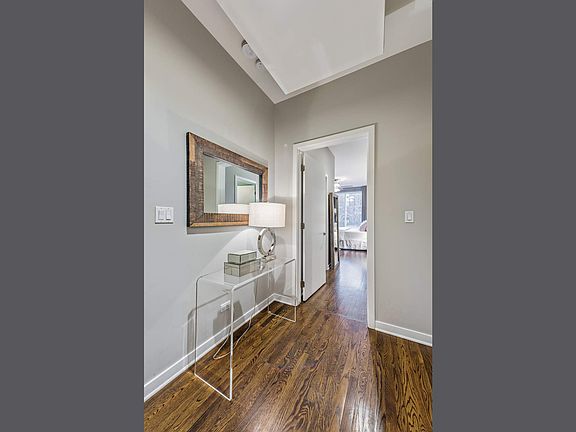 Dedicated entryway with walk in coat closet