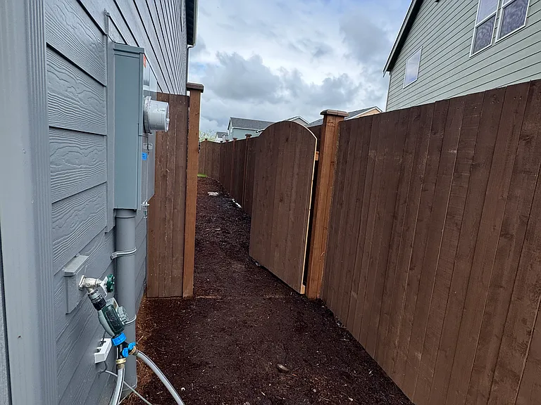 Right side of home leading to back yard.