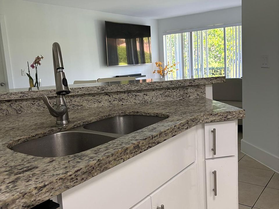 1st image of 9033 Wiles Rd APT 101