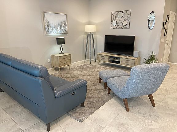 OPEN PLAN LIVING ROOM, WITH FAN