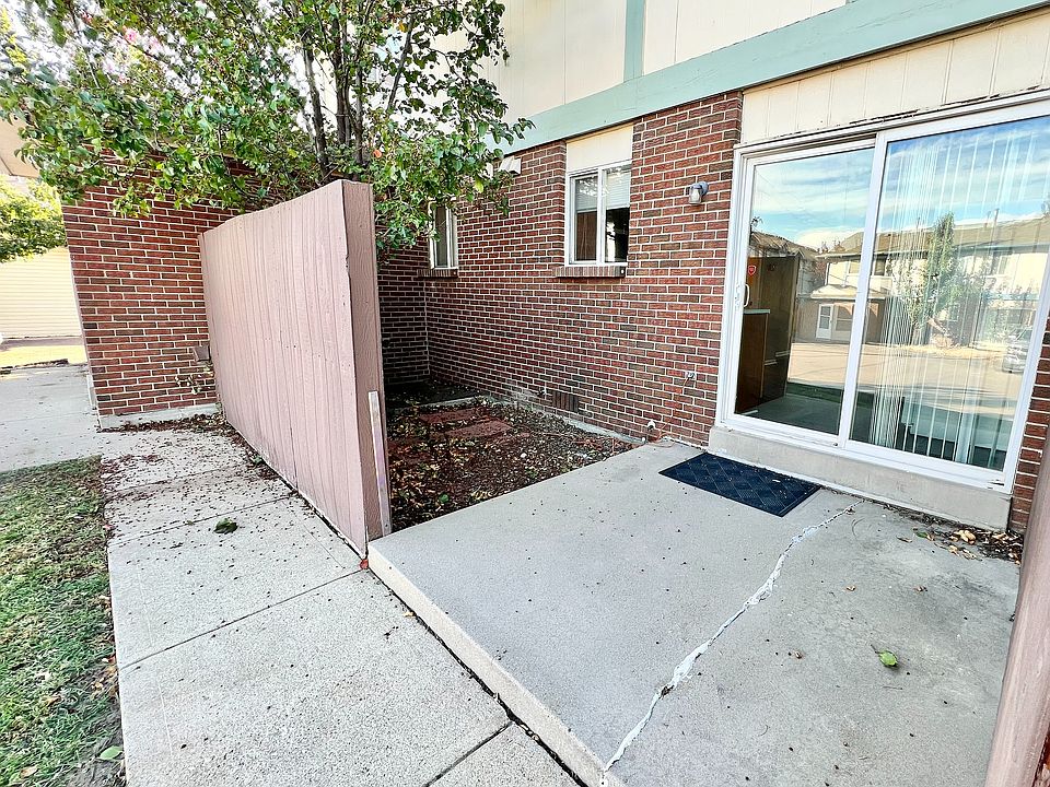 Step into relaxation on this cozy patio, perfect for enjoying peaceful mornings.