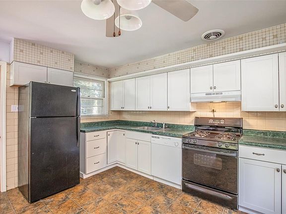 Newly installed kitchen cabinetry with Lazy Susan and a brand NEW dishwasher