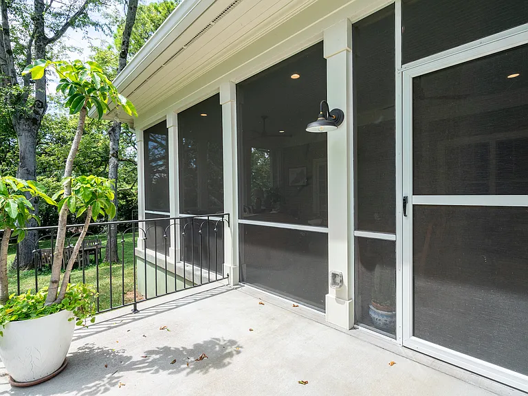 Landing outside screened-in porch