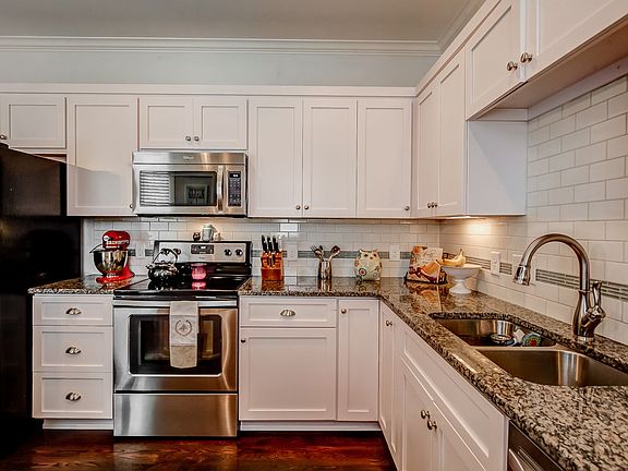 It  features white cabinets.