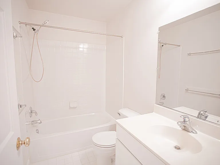 Guest bathroom with bathtub and a shower