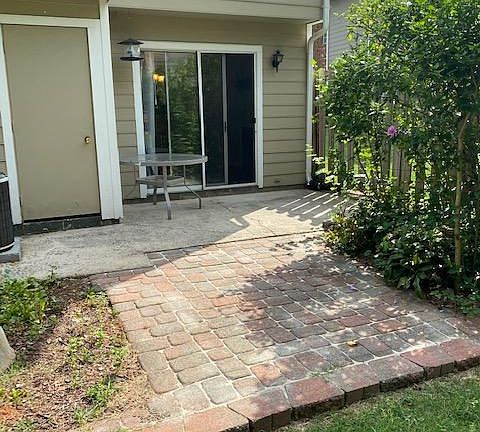 Extra large private patio with new fence.