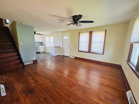 Living room flows into kitchen.