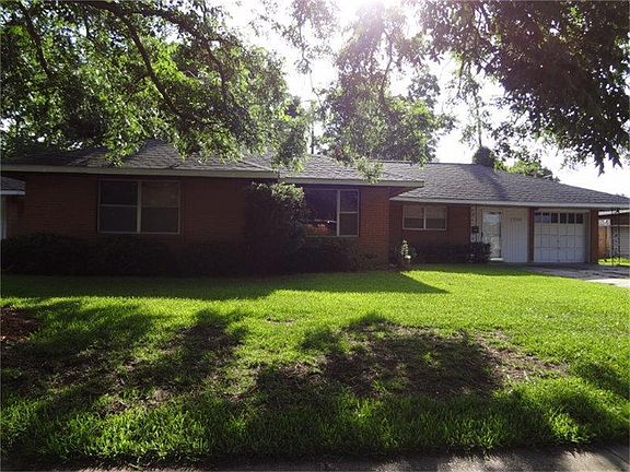 All brick, roof replaced 2009.