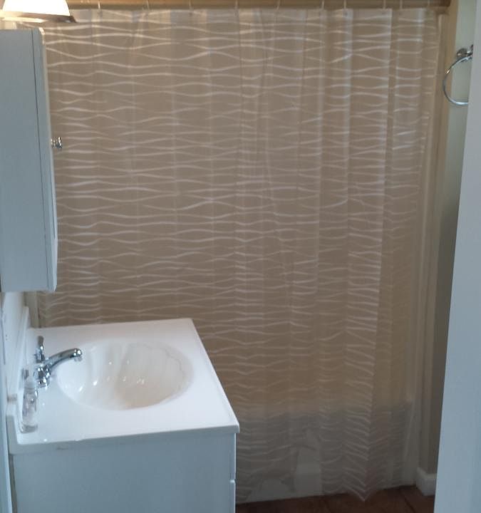 Updated bathroom with tile floor