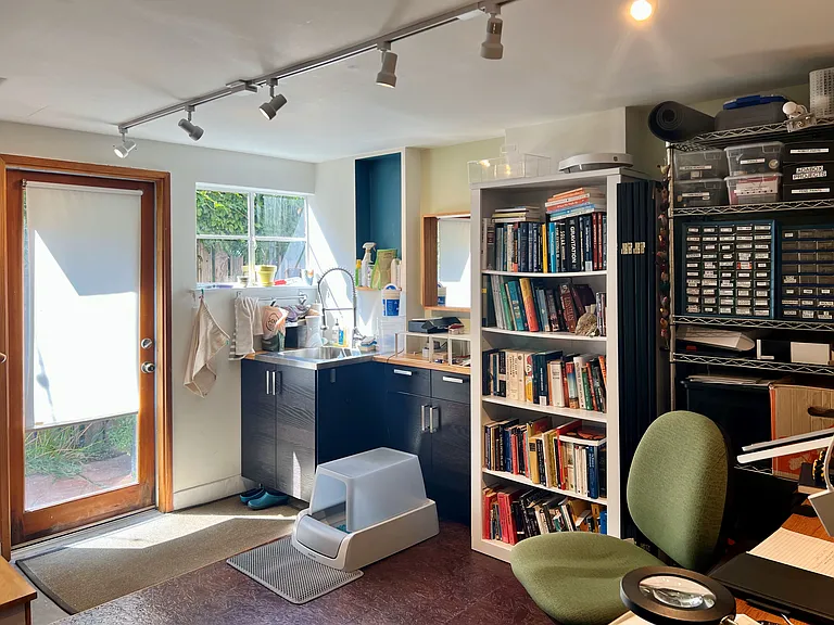 Bonus room - great for hobby room, play room, home office or extra bedroom; glass door to side yard
