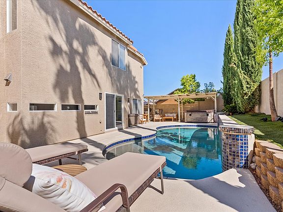 Backyard Oasis with solar heated pool and hot tub