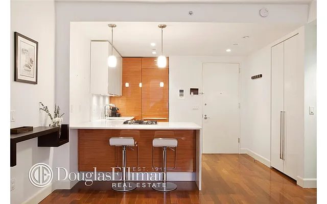 Sold by Douglas Elliman | media 12