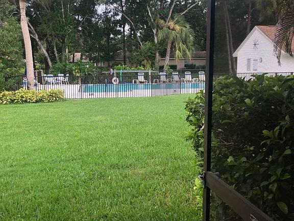 Just steps to 1 of 2 heated association pool.