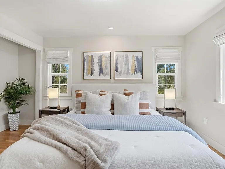 Peaceful primary bedroom retreat overlooking the yard