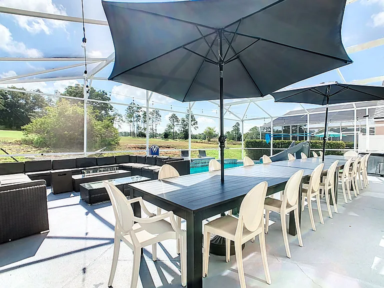 Outdoor Dining - Host exclusive private chef dinners for up to 24 guests outside and 20 inside, complemented by Philip Starck designed chairs. Enjoy scenic views of the private pool, golf course, and unwind by the Fire Pit with a cocktail.