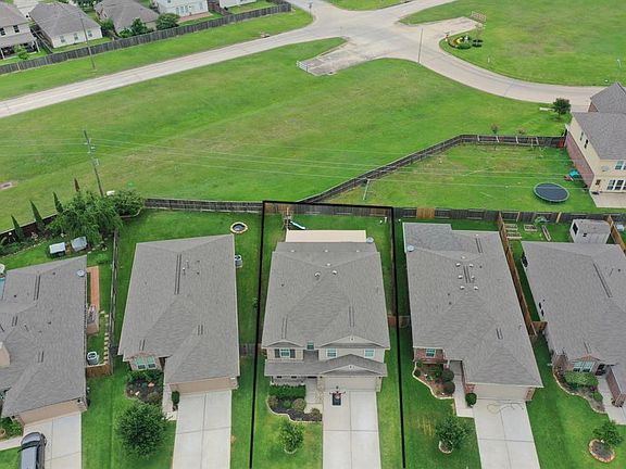 This aerial view shows just how much this home stands out from the rest! The back of the home backs up to the very corner of the back neighbors almost as if you have no back neighbors giving you a relaxing atmosphere of the backyard, but we'll get to