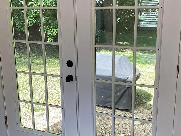 Outdoor patio set with cushions and grill included in rental