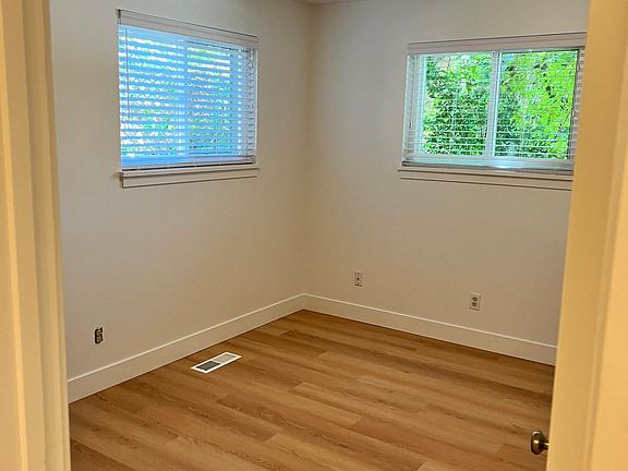 Third bedroom has new flooring, paint, window sills and blinds.
