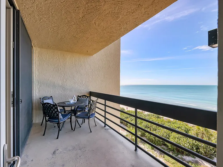 Balcony with full gulf-facing view. Access from living room and primary bedroom. (Please note balcony floors are in progress of being refinished by association.)