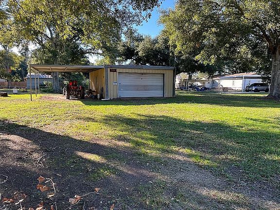 Large backyard with shop