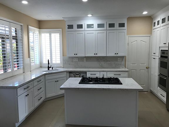 Updated Kitchen with center island and newer appliances. Includes Refrigerator