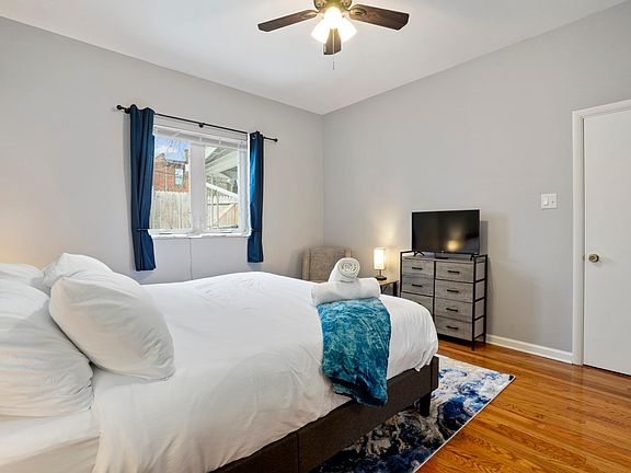 In our 1st-floor bedroom, it's not just about the comfort. You'll also find two closets, a dresser for your convenience, a 32" TCL Roku Smart TV for entertainment, and an inviting armchair for relaxation. It's a space designed to ensure your utmost comfor