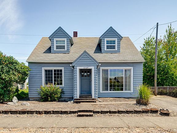 Yard care is paid for by the owner. The driveway on the right has ample room for parking.