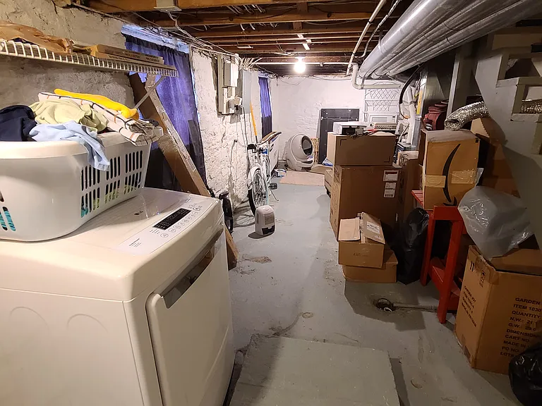 large dry basement with washer and dryer hookups