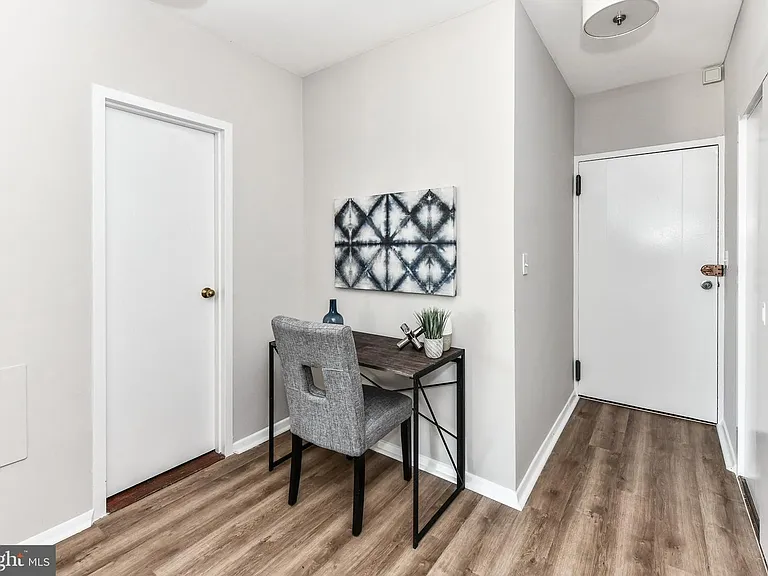 Entryway with large hall closet.