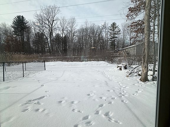 Shared backyard, neighbors area is fenced in.