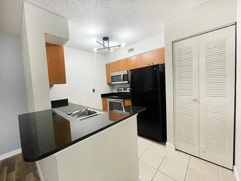 2810 N Oakland Forest Dr #207 — Photo 14