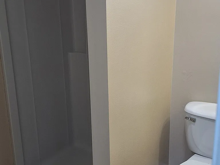 bathroom with walk in shower