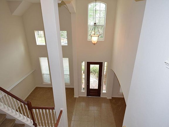 Dramatic vaulted ceiling entry...