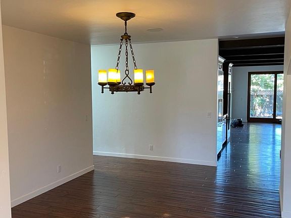 Dining room from front entrance (which includes keypad for ADT security - to be setup and paid by tenant)