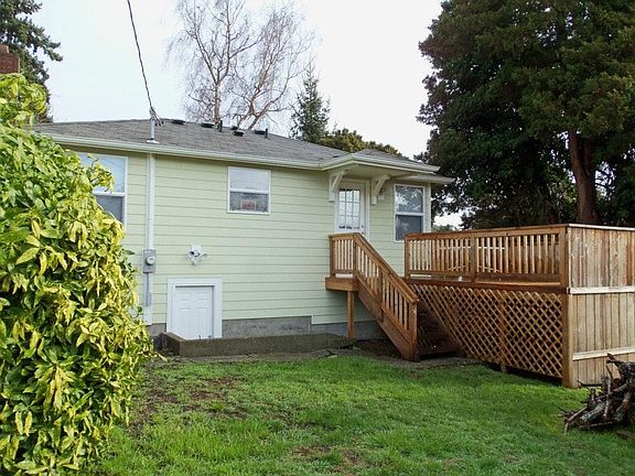 back of the house with deck