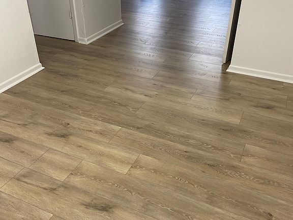 Dining room into living room
ALL NEW FLOOR