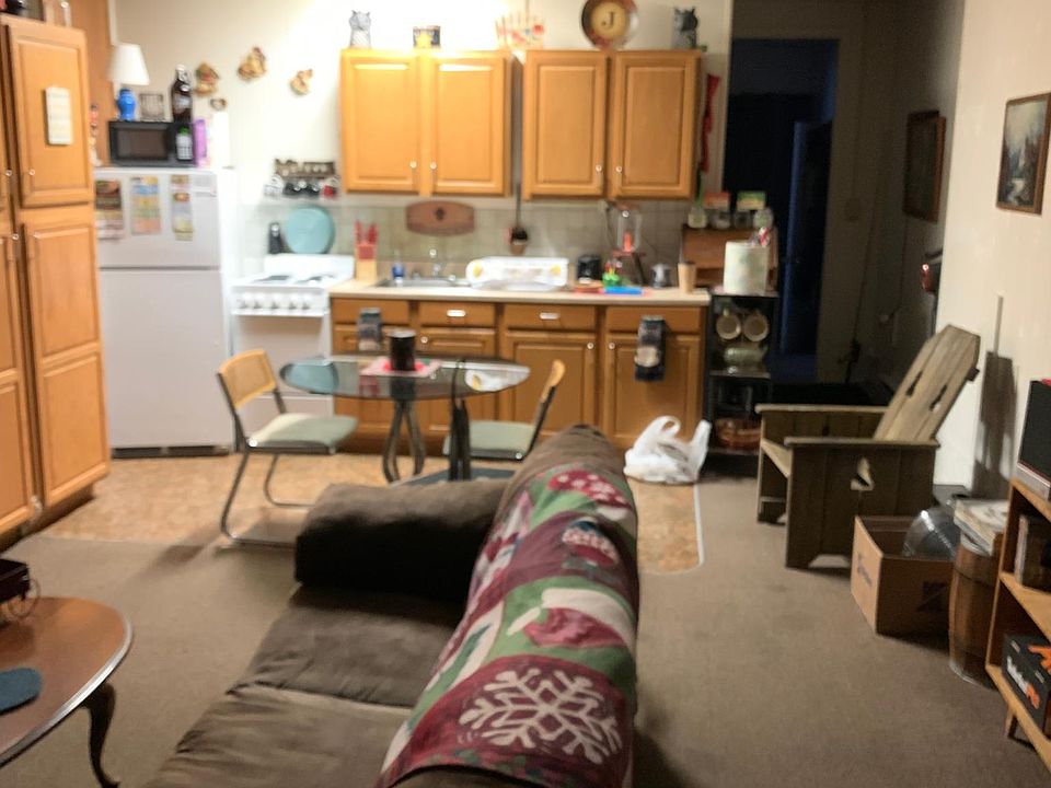 living room open into the kitchen