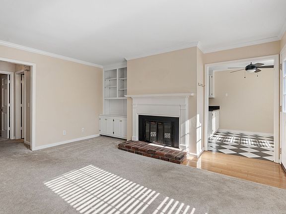 Den with eat in kitchen area