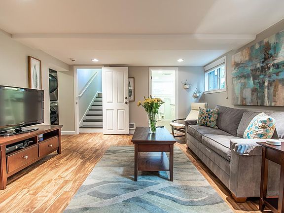 Living room has a fold-out couch with an air mattress that_s quite comfy