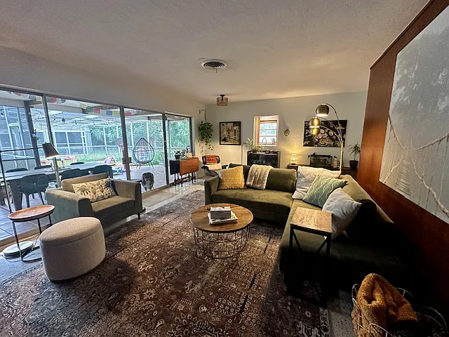 Living area overlooking patio and back yard.