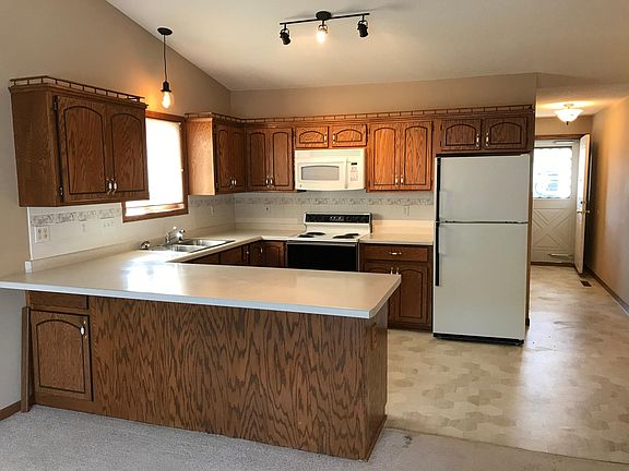 Lots of cabinets in kitchen. New flooring in kitchen also.