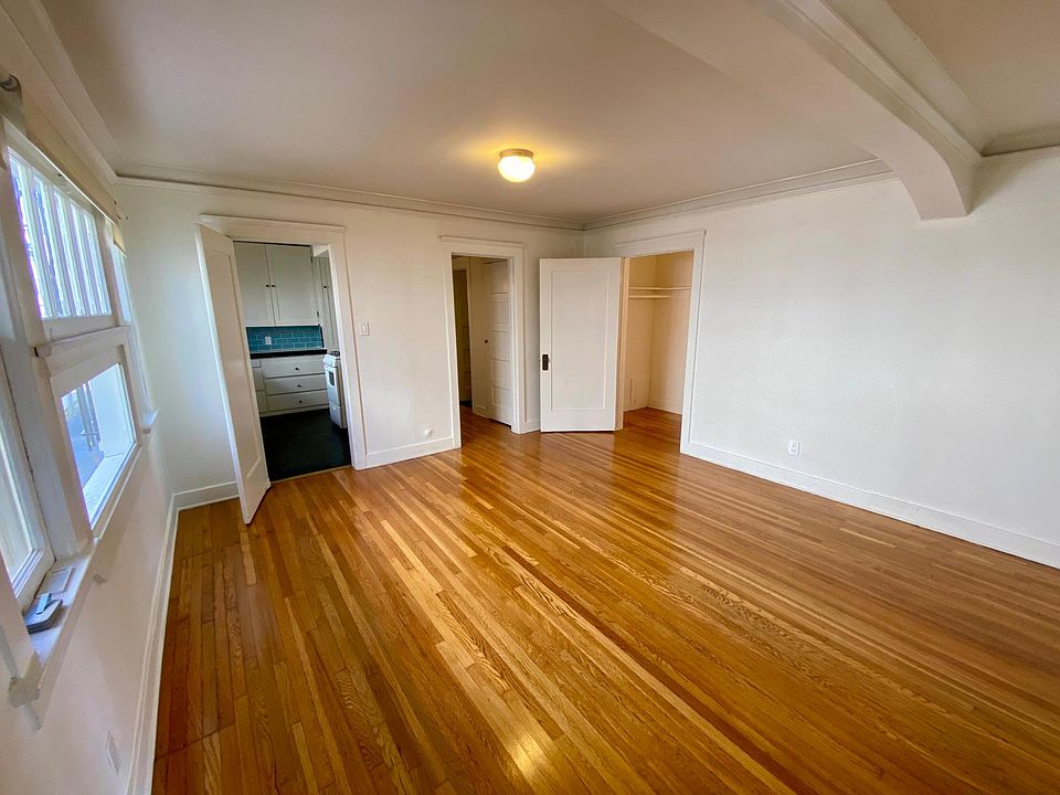 Main living room with large closet off.