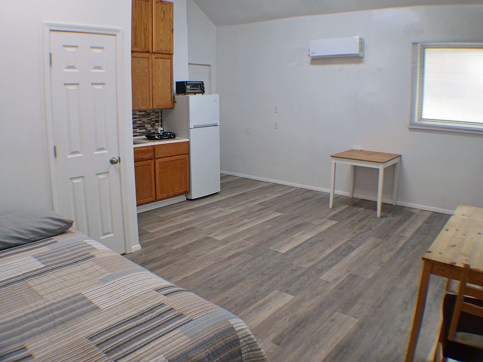VIEW OF APARTMENT FROM BED AREA