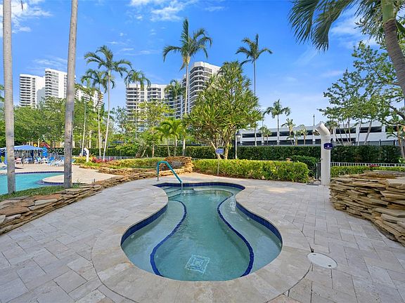 5th image of 3500 Mystic Pointe Dr APT 305